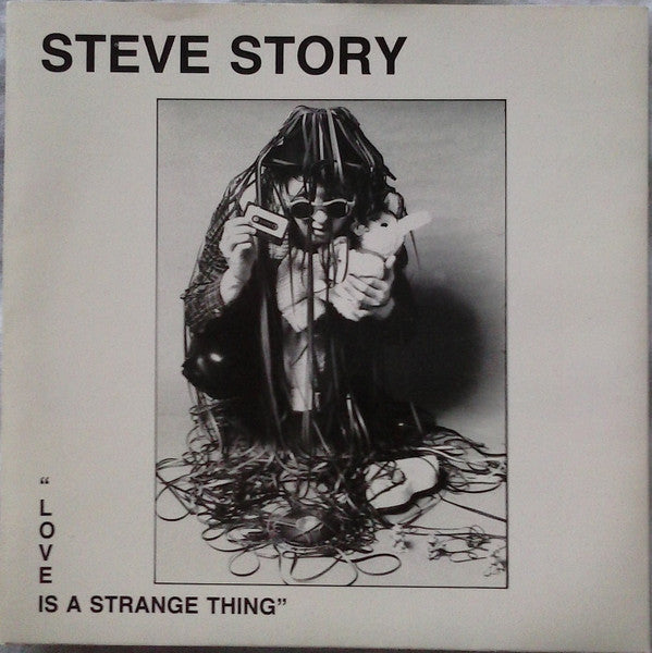Love Is A Strange Thing Discogs cover art